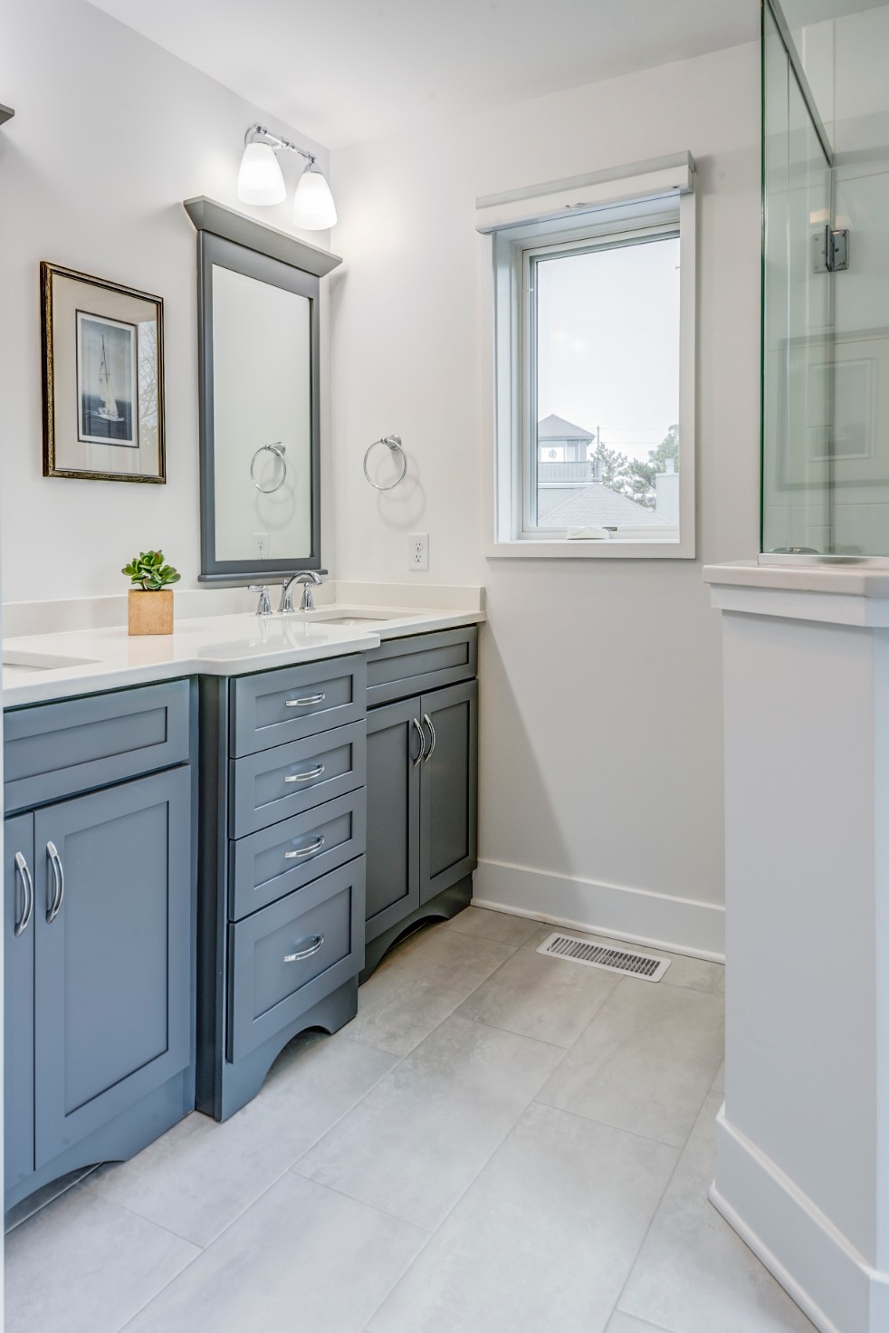 Cotton Patch Hills Bathroom Remodel in Bethany Beach DE with Shaker Cabinets and Rectangular Mirror