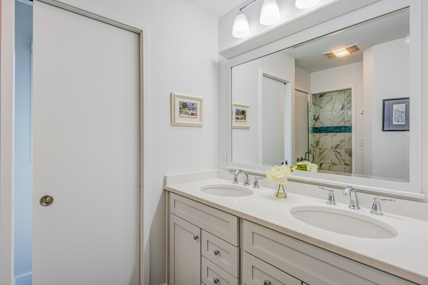 Cotton Patch Hills Renovation in Bethany Beach DE - Bathroom with Dual Sink, White Shaker Cabinets and White Top