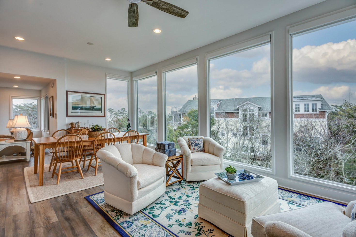 Cotton Patch Hills Renovation in Bethany Beach DE - Great Room with Large Windows and Medium Wood Flooring