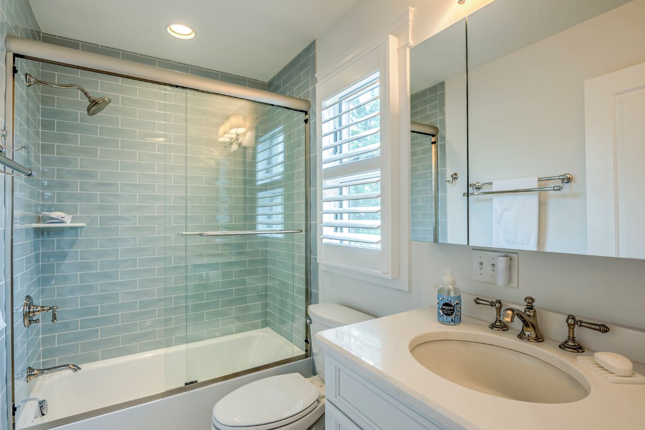 Guest Bathroom with Sliding Glass Shower Door