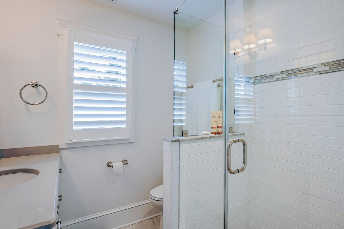 Guest Bathroom with White Walls and Frameless Glass Shower Cabin