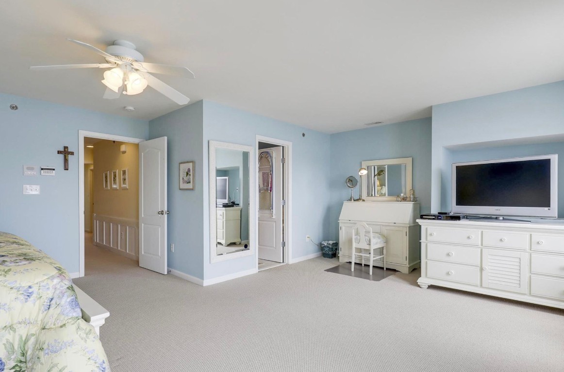 Hatteras Drive Master Suite in Bethany Beach DE - Before - Bedroom with Light Beige Carpet