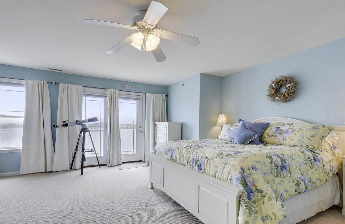 Hatteras Drive Master Suite in Bethany Beach DE - Before - Bedroom with Light Blue Wall Paint