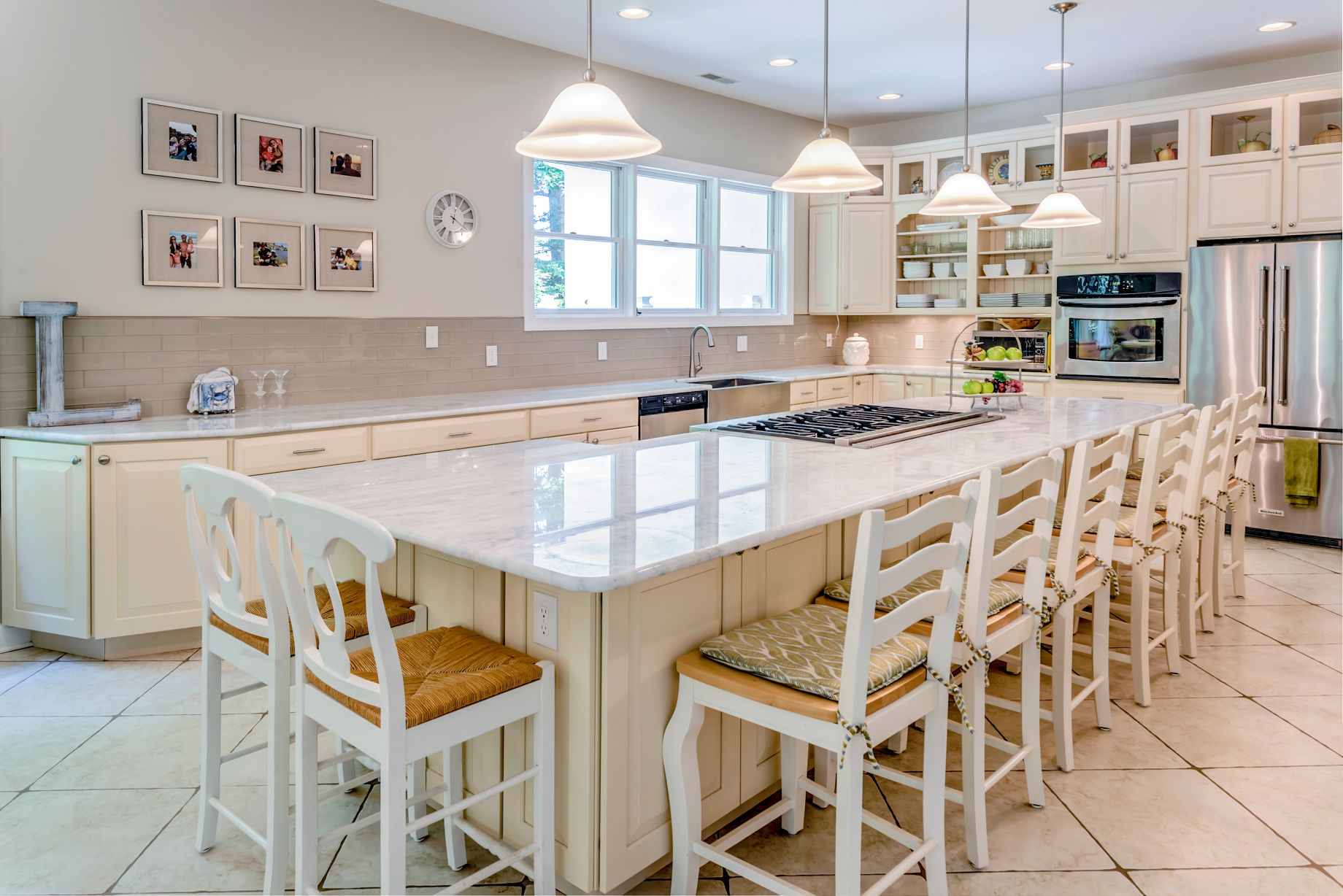 Addition in Juniper Court, Ocean Pines MD - Dining Area with Island, White Marble Countertop and White Tiles Flooring