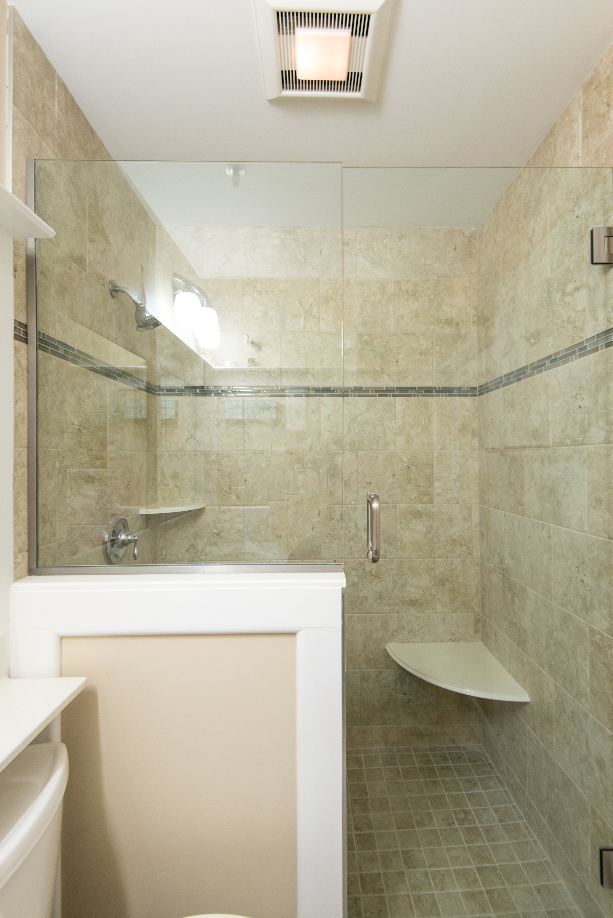 Bathroom Remodel in Kings Grant, Fenwick Island DE with Frameless Glass Shower Door and Nordic Grey Marble Wall Tiles