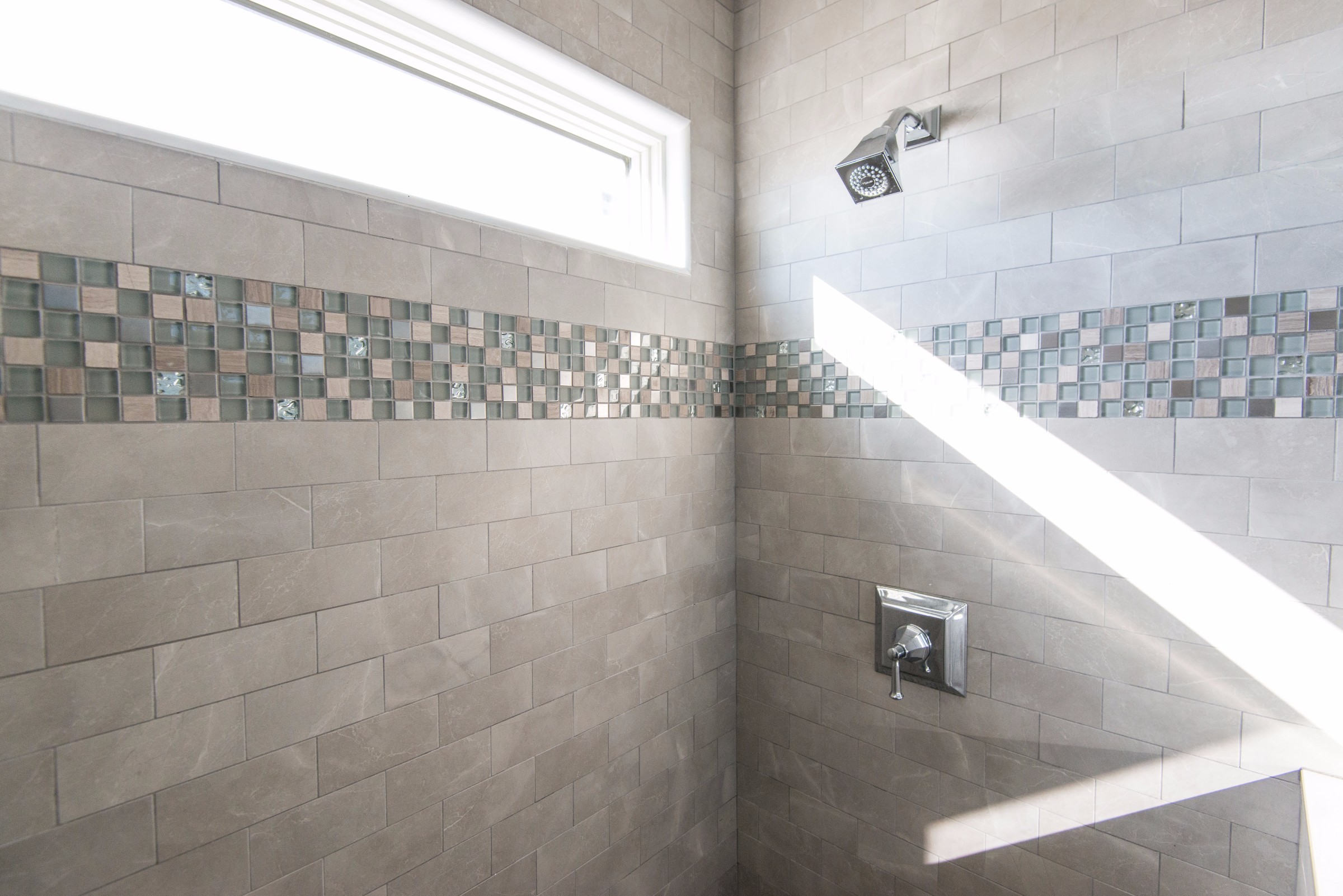 Bathroom Remodel in Kings Grant, Fenwick Island DE with Nordic Grey Wall Tiles, Decorative Glass Mosaic Tiles and Square Shower