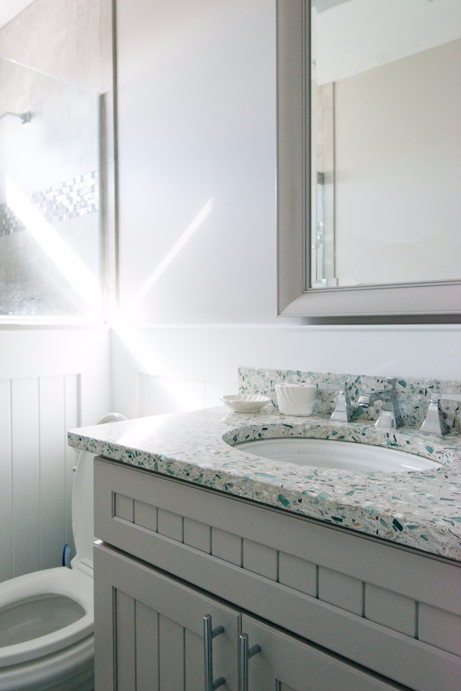 Kings Grant Bathroom Remodel Vol 7 Sea Light Design Build Bathroom Remodel In Kings Grant Fenwick Island De With White Wood Vanity Vetrazzo Blue