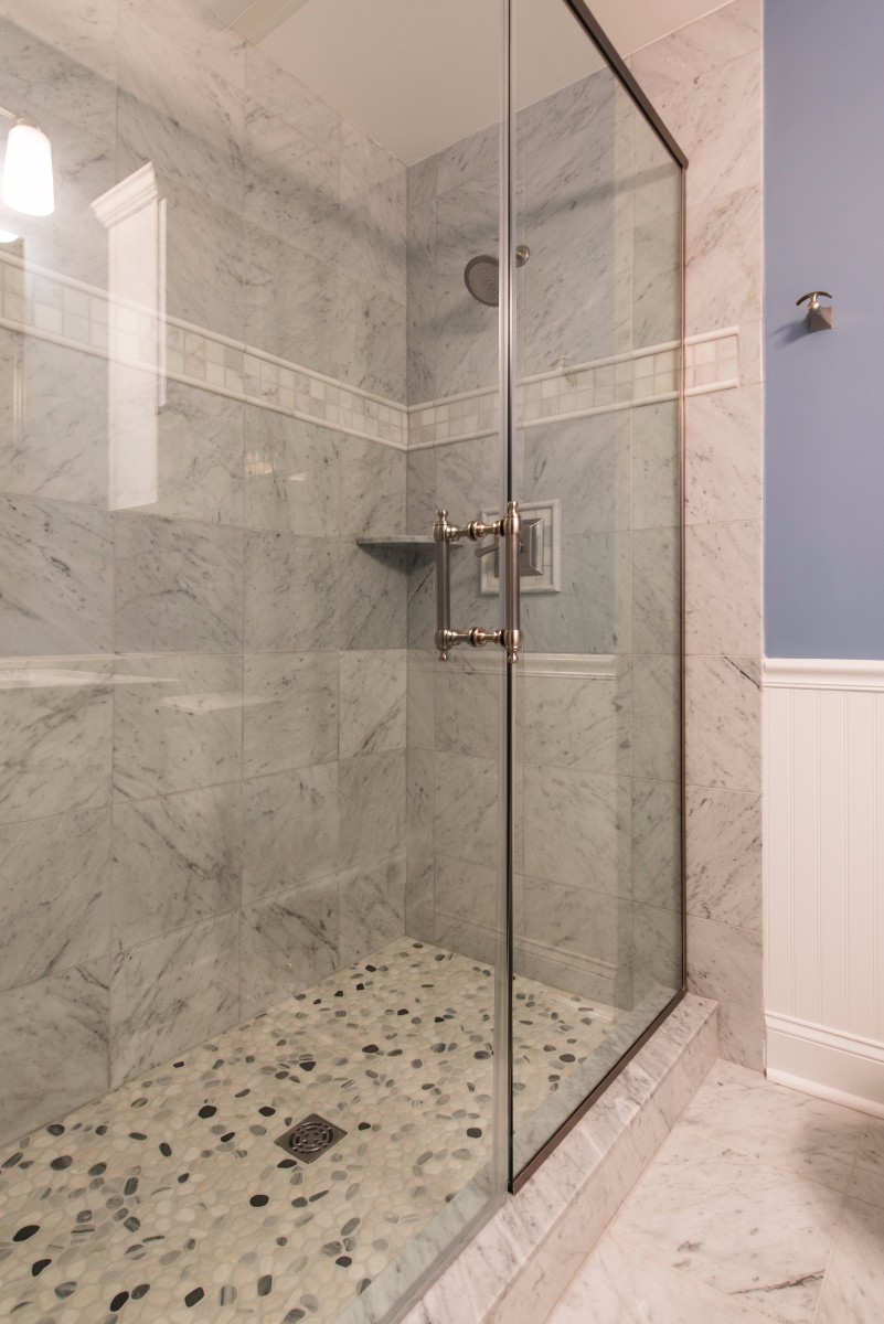 Bathroom Remodel in Ocean Ridge, Bethany Beach DE with Glass Shower Door, Grey Marble Wall Tiles and Round Shower