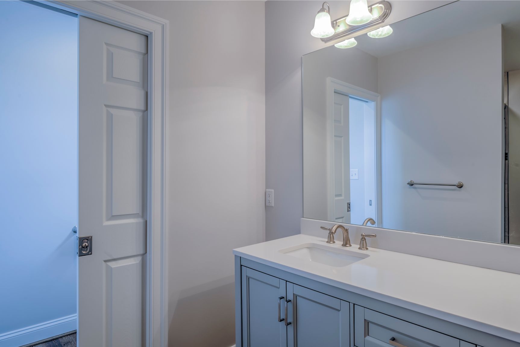 New Addition in October Glory, Ocean View DE - Bathroom with White Sliding Door