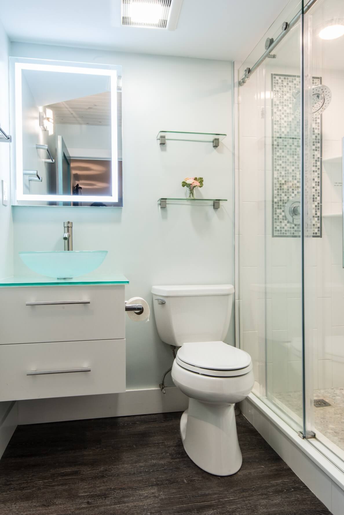 Sea Colony Condo Renovation Vol.2 Bethany Beach, DE Bathroom with Floating White Gloss Vanity Cabinet and Back Lit Mirror