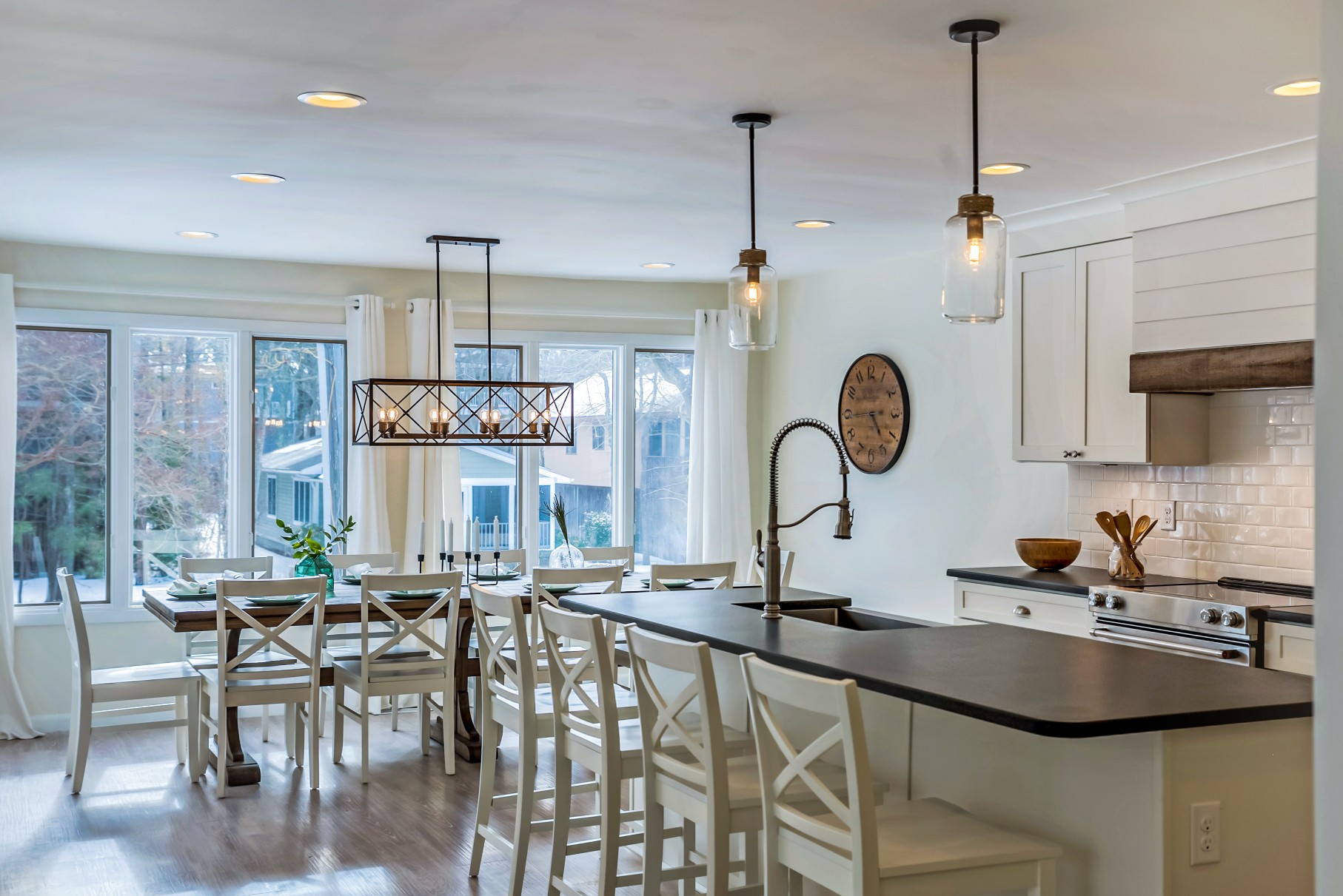 Kitchen Remodel in Wellington Parkway, Bethany Beach DE with Center Isle, Dining Table for Ten and White Wooden Chairs